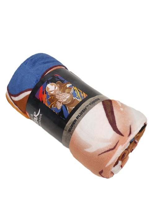 Rolled-up blanket with colorful design on a white background